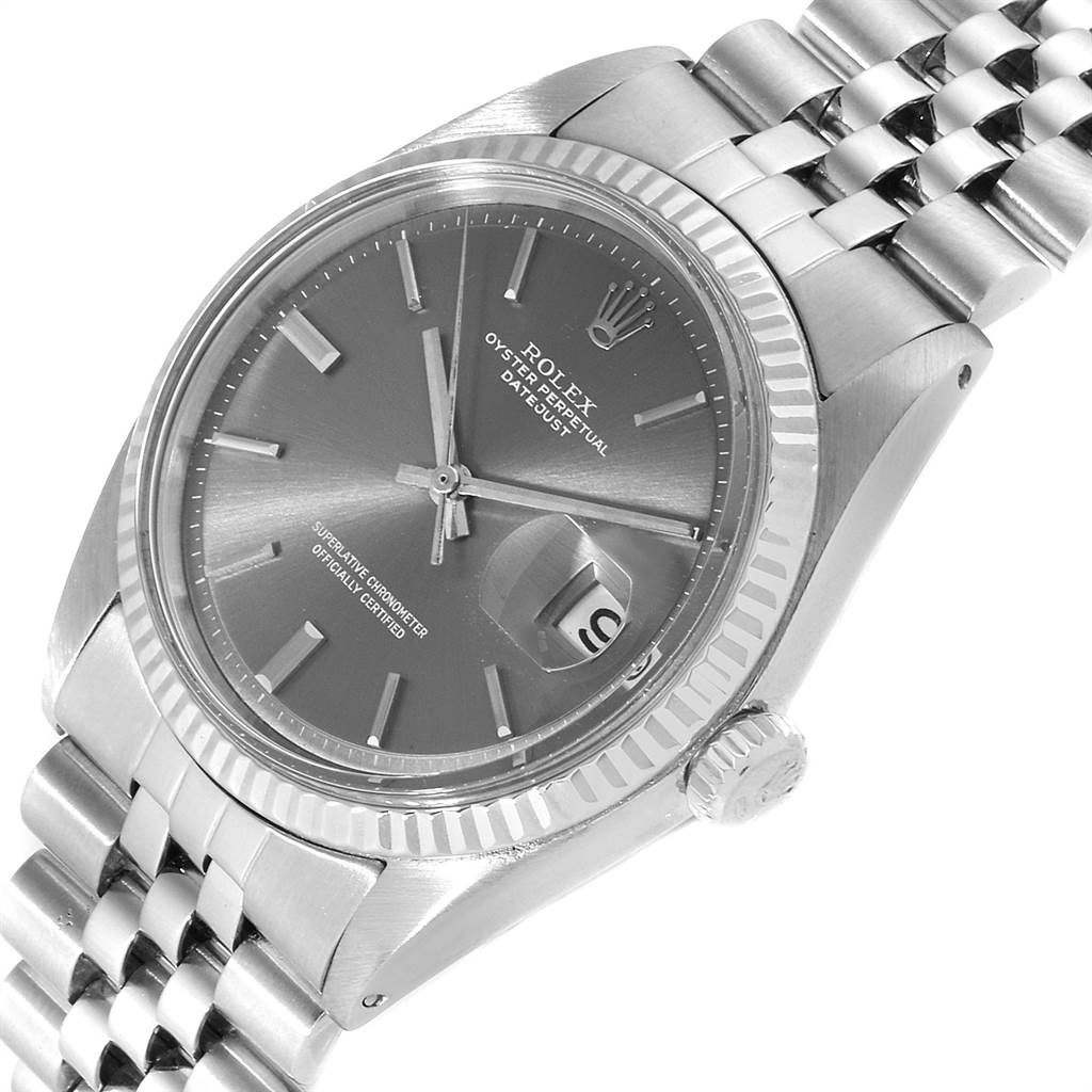The Rolex Vintage Collection 1601 Men's Stainless Steel Grey Dial 1601 Men's Stainless Steel Grey Dial watch is shown from an oblique angle highlighting the face, bezel, crown, and part of the bracelet.