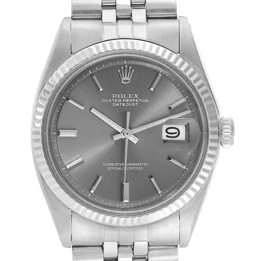 The image shows a close-up view of a Rolex Vintage Collection 1601 Men's Stainless Steel Grey Dial 1601 Men's Stainless Steel Grey Dial Oyster Perpetual Datejust watch, highlighting the dial, crown, and part of the bracelet.