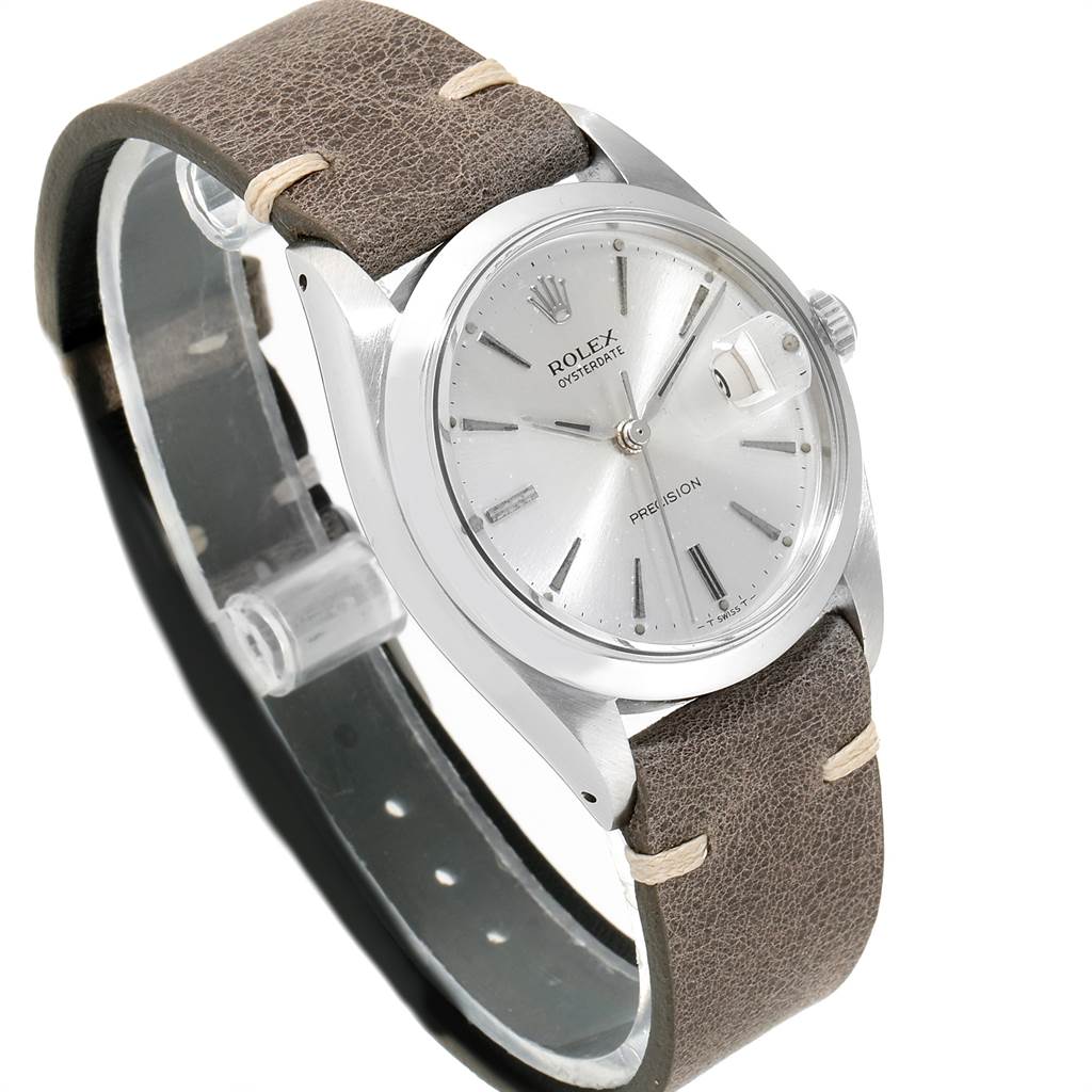 This Rolex Vintage Collection 6694 Men's Stainless Steel Silver Dial 6694 Men's Stainless Steel Silver Dial model is shown at a three-quarter angle displaying its face, bezel, case, leather strap, and crown.