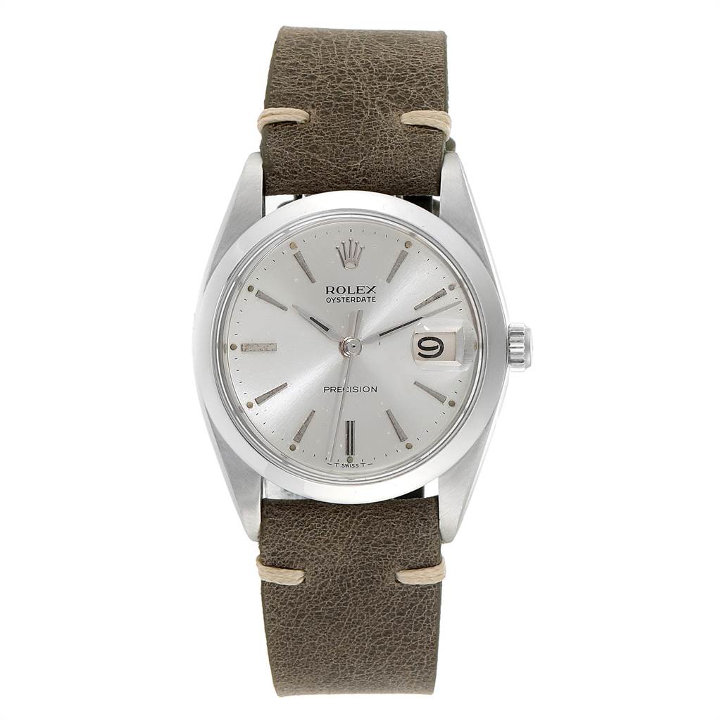 The image shows a front view of the Rolex Vintage Collection 6694 Men's Stainless Steel Silver Dial 6694 Men's Stainless Steel Silver Dial Oysterdate watch, displaying its dial, case, and brown leather strap.
