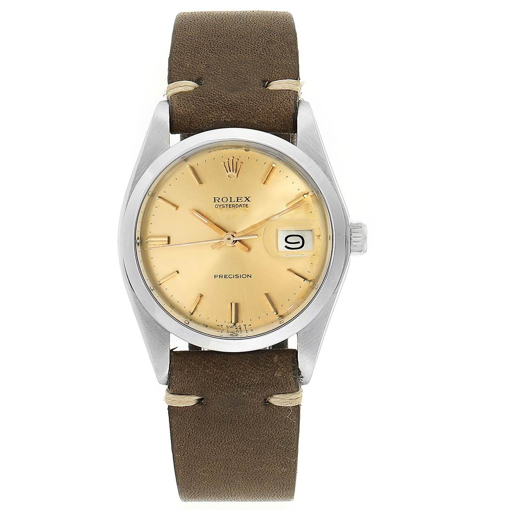 The Rolex Vintage Collection 6694 Men's Stainless Steel Champagne Dial 6694 Men's Stainless Steel Champagne Dial model is shown from a top-down angle, highlighting the beige dial, hour markers, and brown leather strap.
