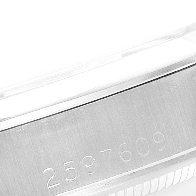 The image shows a close-up of the serial number engraved on the case of a Rolex Vintage Collection 1500 Men's Stainless Steel Silver Dial 1500 Men's Stainless Steel Silver Dial model watch.