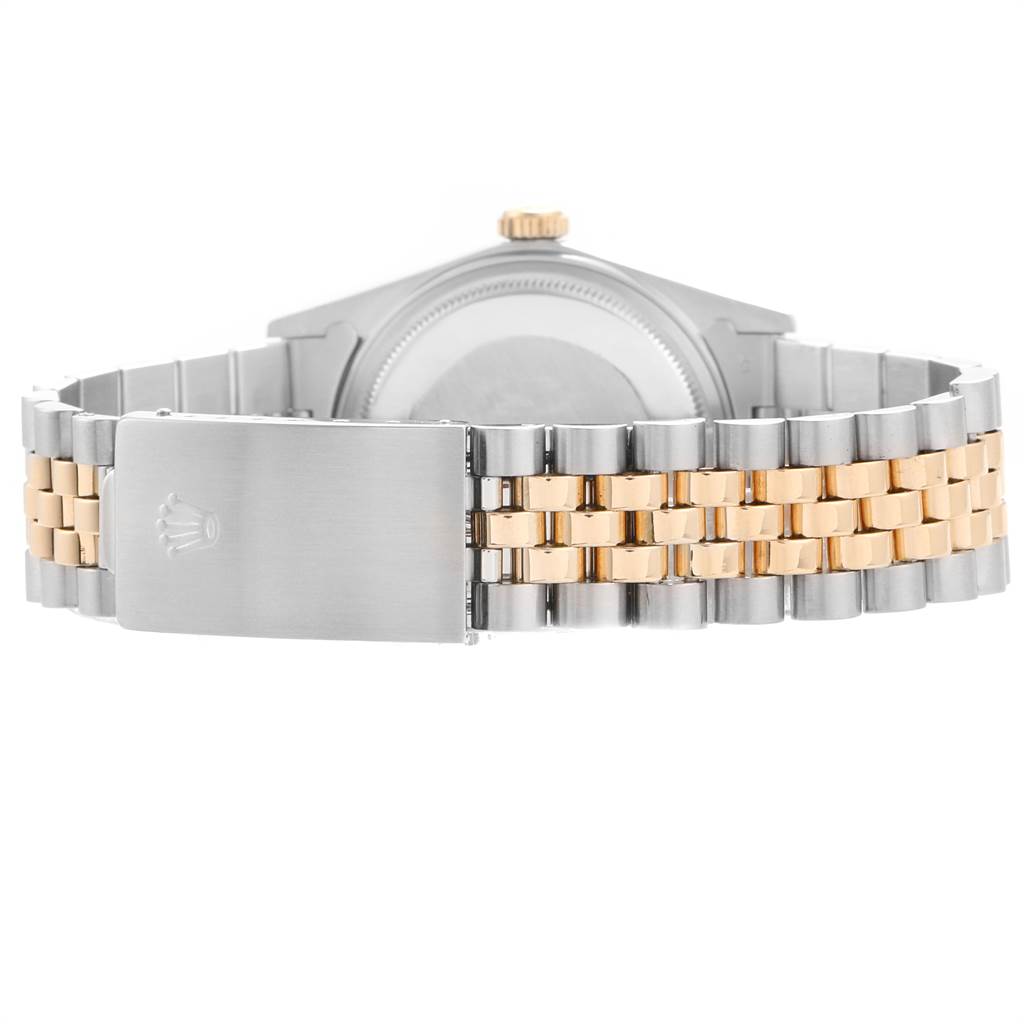 The image shows the back view of a Rolex Vintage Collection 16013 Men's Stainless Steel Champagne Dial 16013 Men's Stainless Steel Champagne Dial model watch, focusing on the two-tone bracelet and clasp.