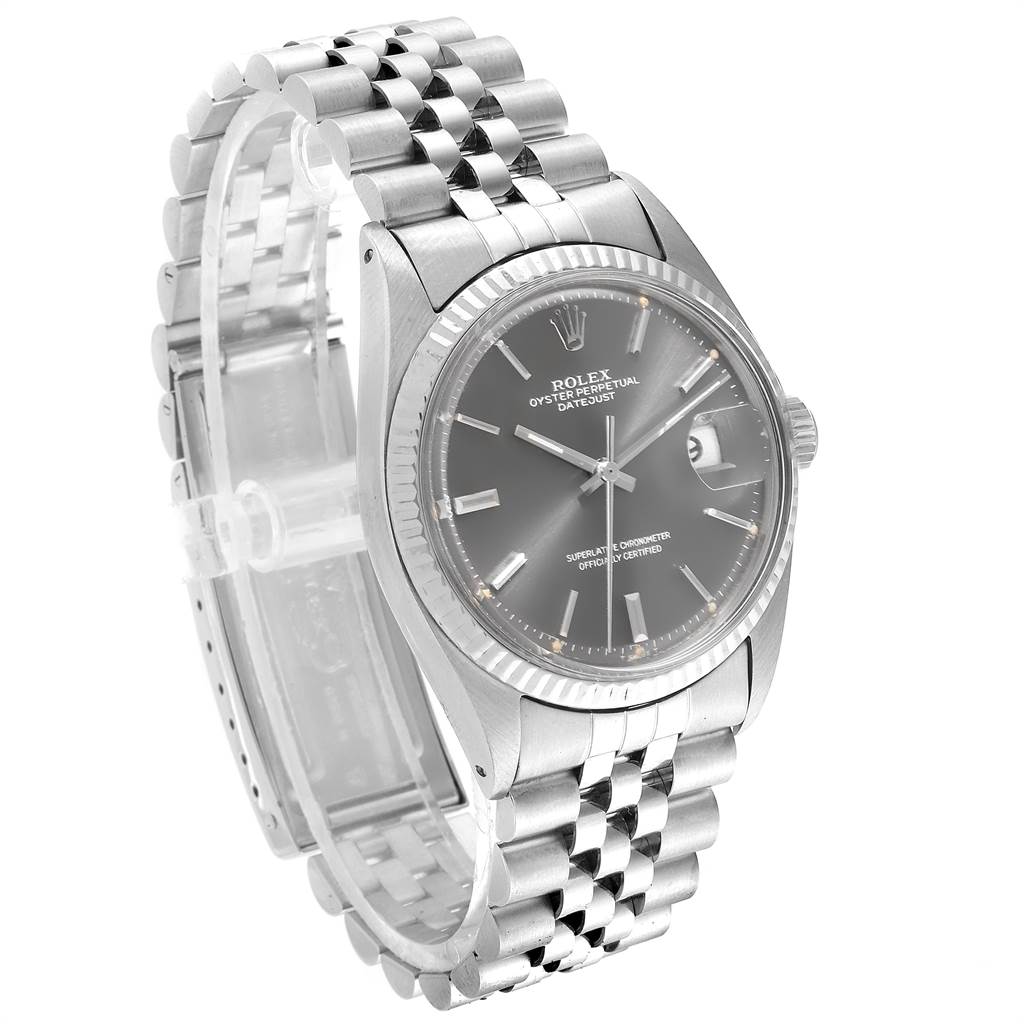 This is a side-angle view of a Rolex Vintage Collection 1601 Men's Stainless Steel Grey Dial 1601 Men's Stainless Steel Grey Dial model watch, displaying the face, bezel, and bracelet.