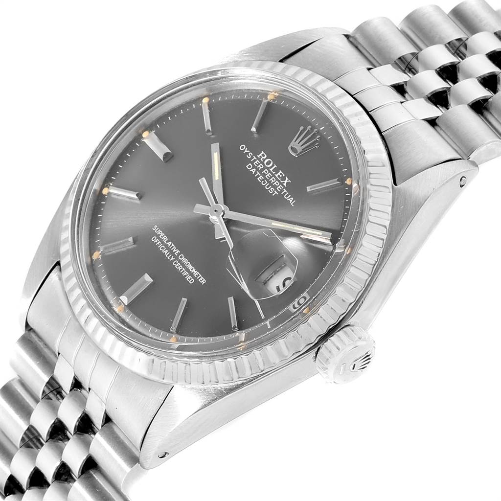 This image shows a close-up, angled view of the Rolex Vintage Collection 1601 Men's Stainless Steel Grey Dial 1601 Men's Stainless Steel Grey Dial model, featuring the watch face, bezel, and part of the bracelet.