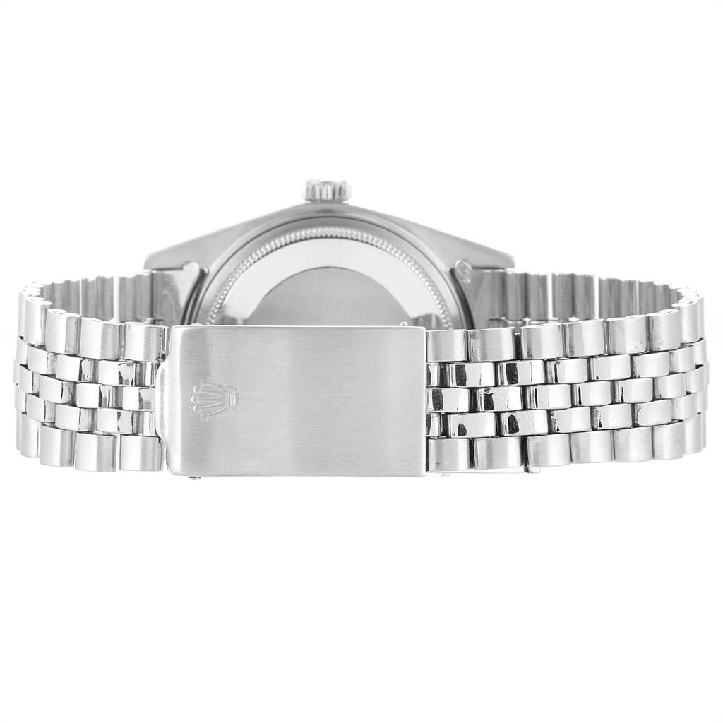 The image shows the back view of a Rolex Vintage Collection 1601 Men's Stainless Steel Green Dial 1601 Men's Stainless Steel Green Dial watch, highlighting the clasp and bracelet.