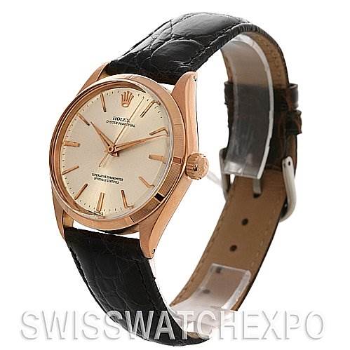 The image shows the Rolex Vintage Collection 1003 Stainless Steel Silver Dial 1003 Stainless Steel Silver Dial watch at a three-quarter angle, highlighting its dial, bezel, case, and leather strap.