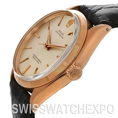 The image shows a side view of the Rolex Vintage Collection 1003 Stainless Steel Silver Dial 1003 Stainless Steel Silver Dial watch, highlighting the crown and case with a black leather strap.