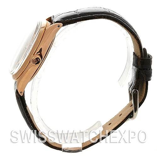 This image shows a Rolex Vintage Collection 1003 Stainless Steel Silver Dial 1003 Stainless Steel Silver Dial model watch from a side angle, highlighting the case, crown, and leather strap.