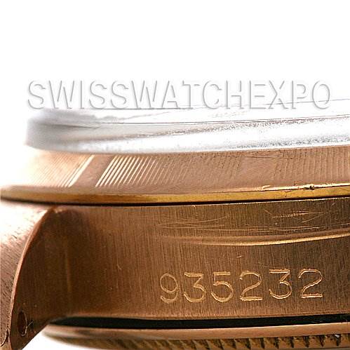 This image shows a close-up angle of the side of a Rolex Vintage Collection 1003 Stainless Steel Silver Dial 1003 Stainless Steel Silver Dial watch, focusing on the serial number engraved into a metallic surface.