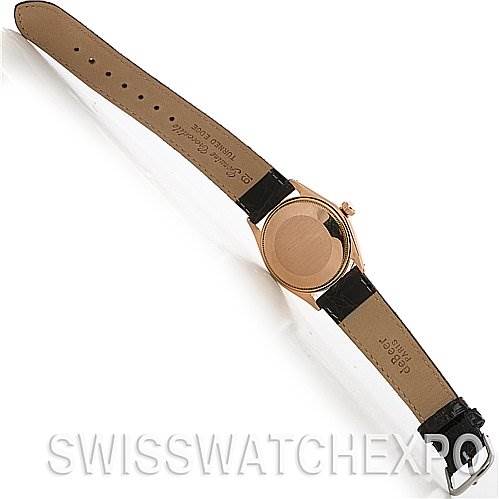 This image shows the back and band of the Rolex Vintage Collection 1003 Stainless Steel Silver Dial 1003 Stainless Steel Silver Dial watch with a leather strap and buckle.