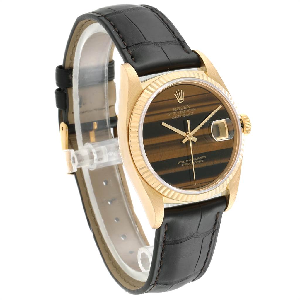 The image shows a Rolex Vintage Collection 16018 Men's Yellow Gold Brown Dial 16018 Men's Yellow Gold Brown Dial watch at a slight angle, highlighting its gold case, black leather strap, and striped dial.