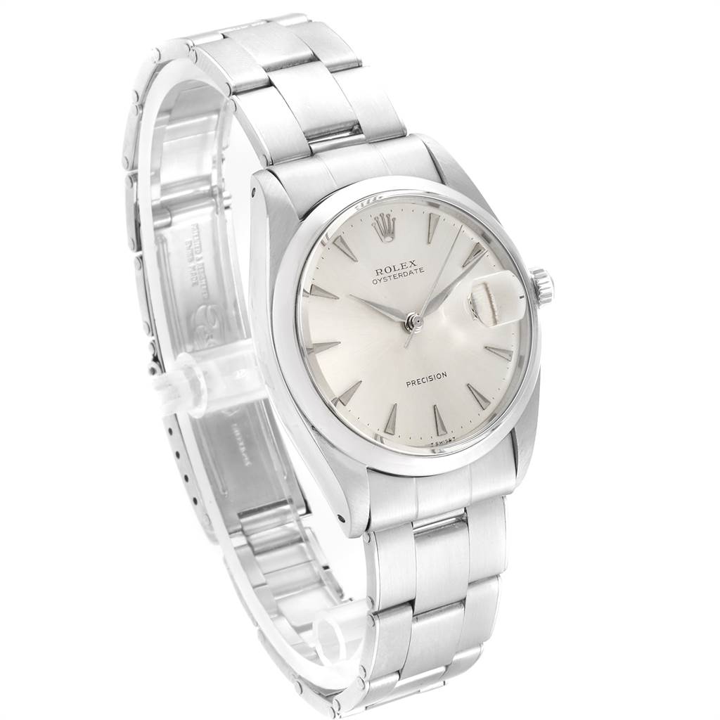 The image shows the front and side view of the Rolex Vintage Collection 6694 Men's Stainless Steel Silver Dial 6694 Men's Stainless Steel Silver Dial watch, highlighting its dial, bezel, and bracelet.