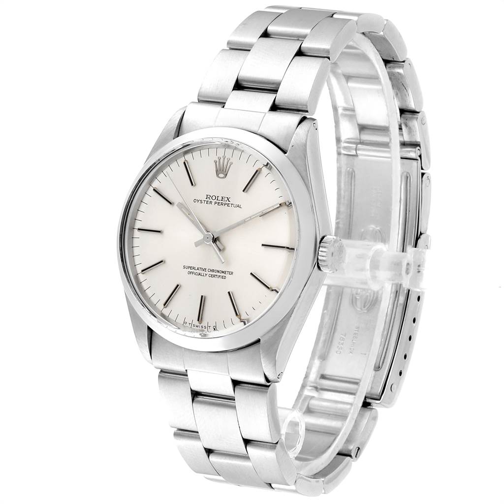 The image shows a vintage Rolex Oyster Perpetual watch from the Vintage Collection, viewed at an angle that highlights the face and bracelet.