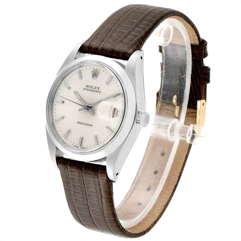The Rolex Vintage Collection 6694 Men's Stainless Steel Silver Dial 6694 Men's Stainless Steel Silver Dial Oysterdate model is shown at a slight angle, focusing on the watch dial and brown leather strap.