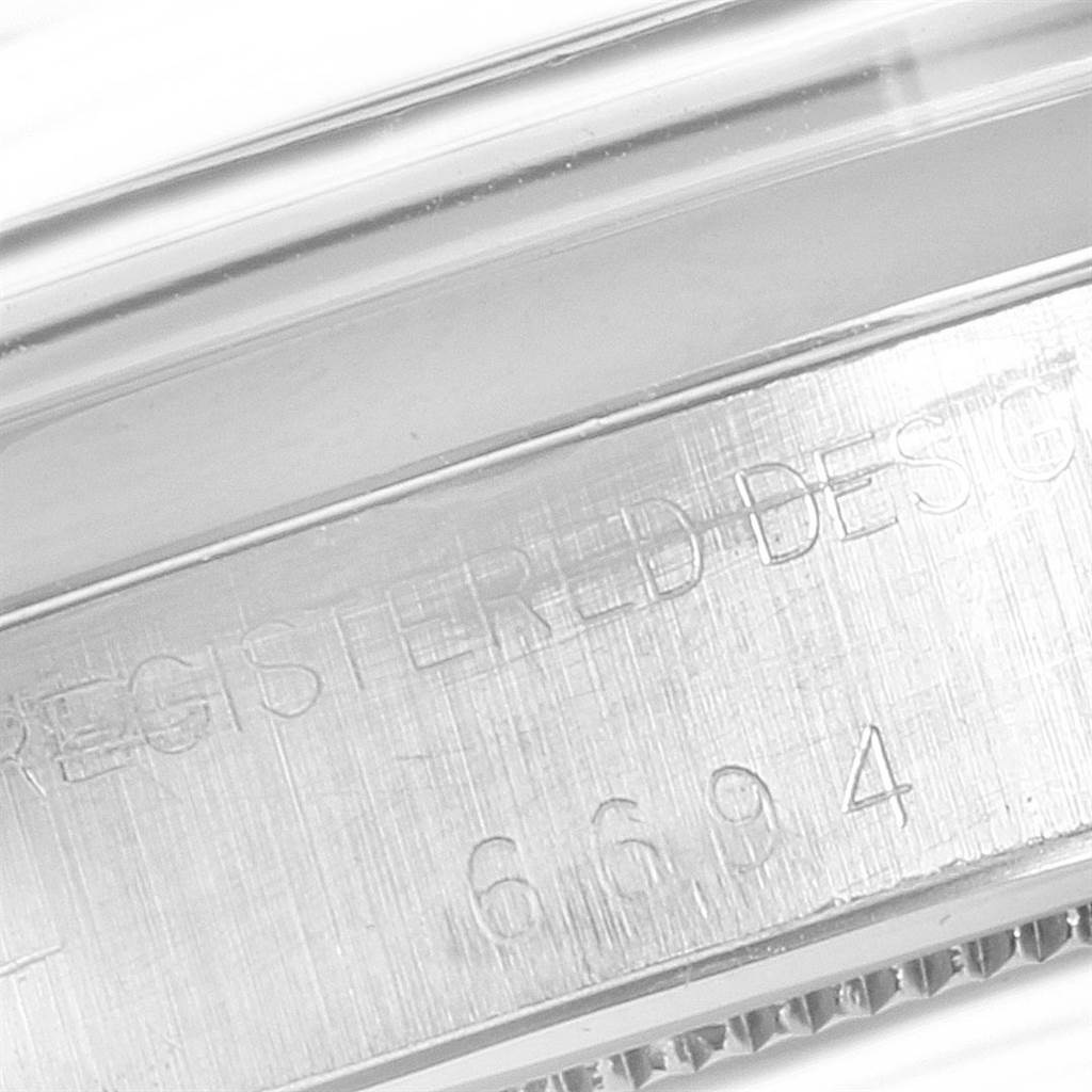 This close-up image showcases the side engraving on a Vintage Collection Rolex watch.
