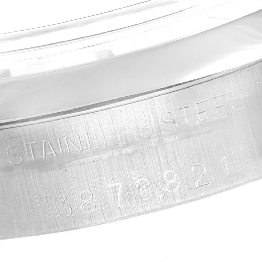 This image shows a close-up of the stainless steel back of a Rolex Vintage Collection 6694 Men's Stainless Steel Silver Dial 6694 Men's Stainless Steel Silver Dial watch, highlighting the serial number.