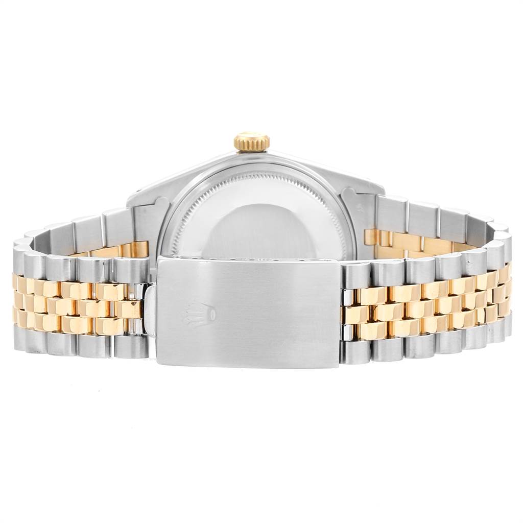 This image shows the back view of a Vintage Collection Rolex watch, highlighting the case back and the two-tone bracelet with the clasp.