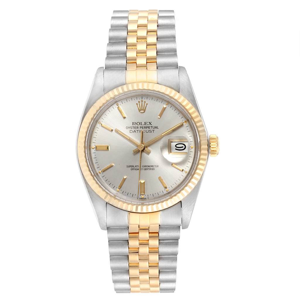 The image shows a frontal view of a Rolex Vintage Collection 16013 Men's Stainless Steel Silver Dial 16013 Men's Stainless Steel Silver Dial Datejust watch, featuring a silver and gold bracelet and a date window.