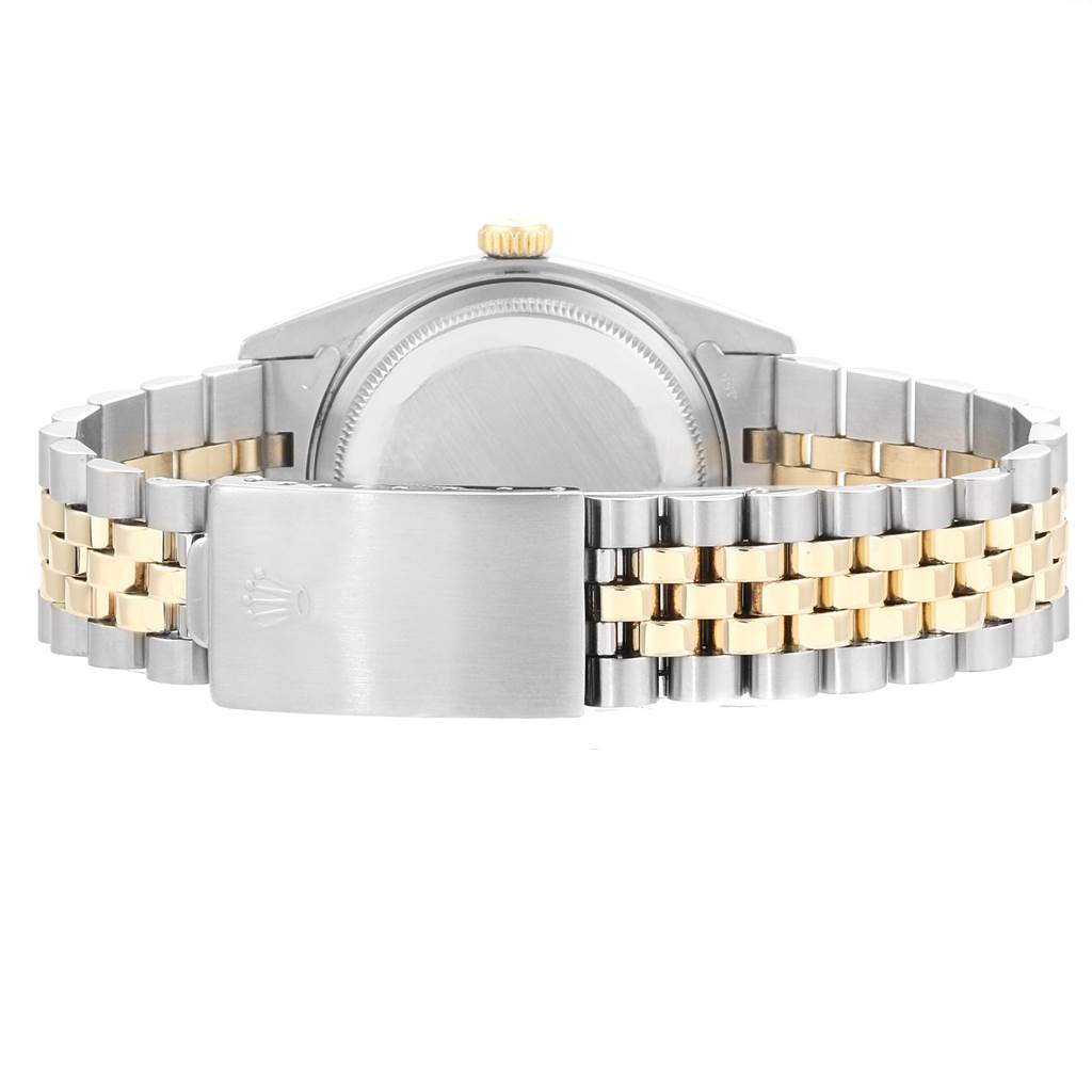 The image shows the back view of the Rolex Vintage Collection 16013 Men's Stainless Steel Champagne Dial 16013 Men's Stainless Steel Champagne Dial watch, highlighting its two-tone bracelet and clasp.