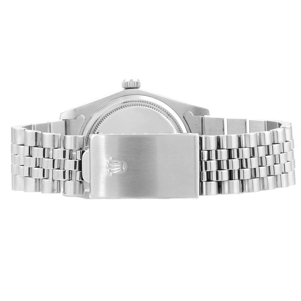 This image shows the back of a Rolex Vintage Collection 6694 Men
s Stainless Steel Silver Dial 6694 Men
s Stainless Steel Silver Dial watch, highlighting the clasp and part of the bracelet.