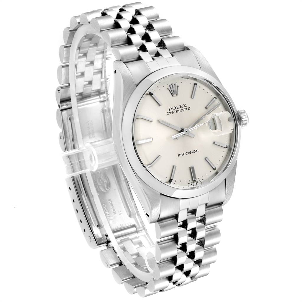 The Rolex Vintage Collection 6694 Men
s Stainless Steel Silver Dial 6694 Men
s Stainless Steel Silver Dial watch is shown at a three-quarter angle highlighting its face, bezel, and bracelet.