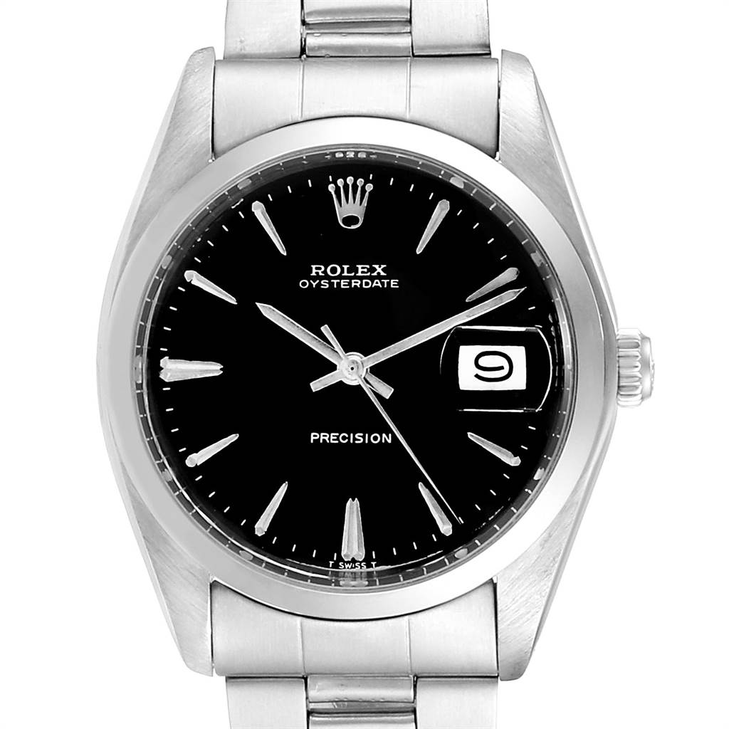The Vintage Collection Rolex watch is shown from a front angle, highlighting its black dial, date, and stainless steel bracelet.