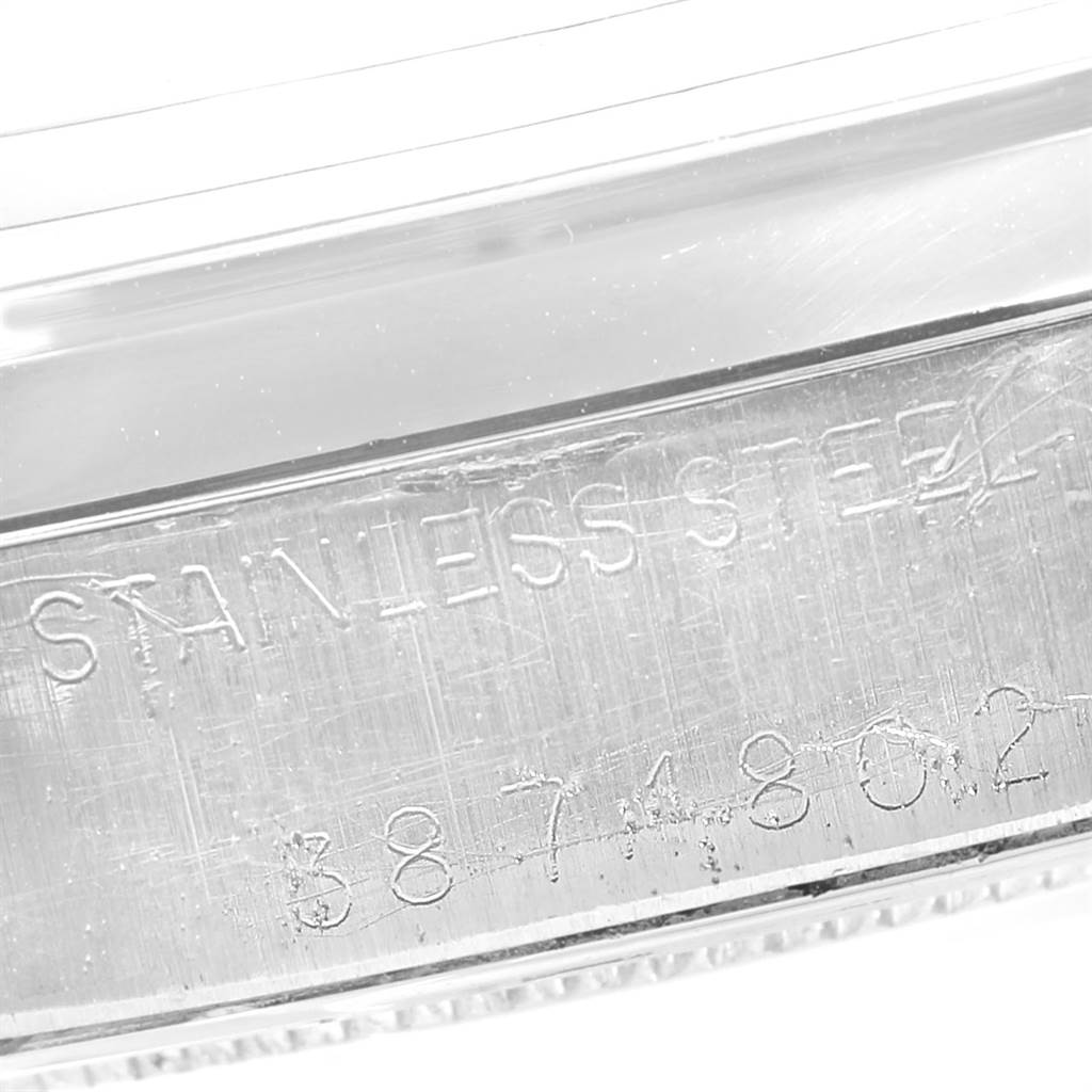 This image shows a close-up of the stainless steel engraving on the case back edge of a Rolex Vintage Collection 6694 Men's Stainless Steel Black Dial 6694 Men's Stainless Steel Black Dial watch.