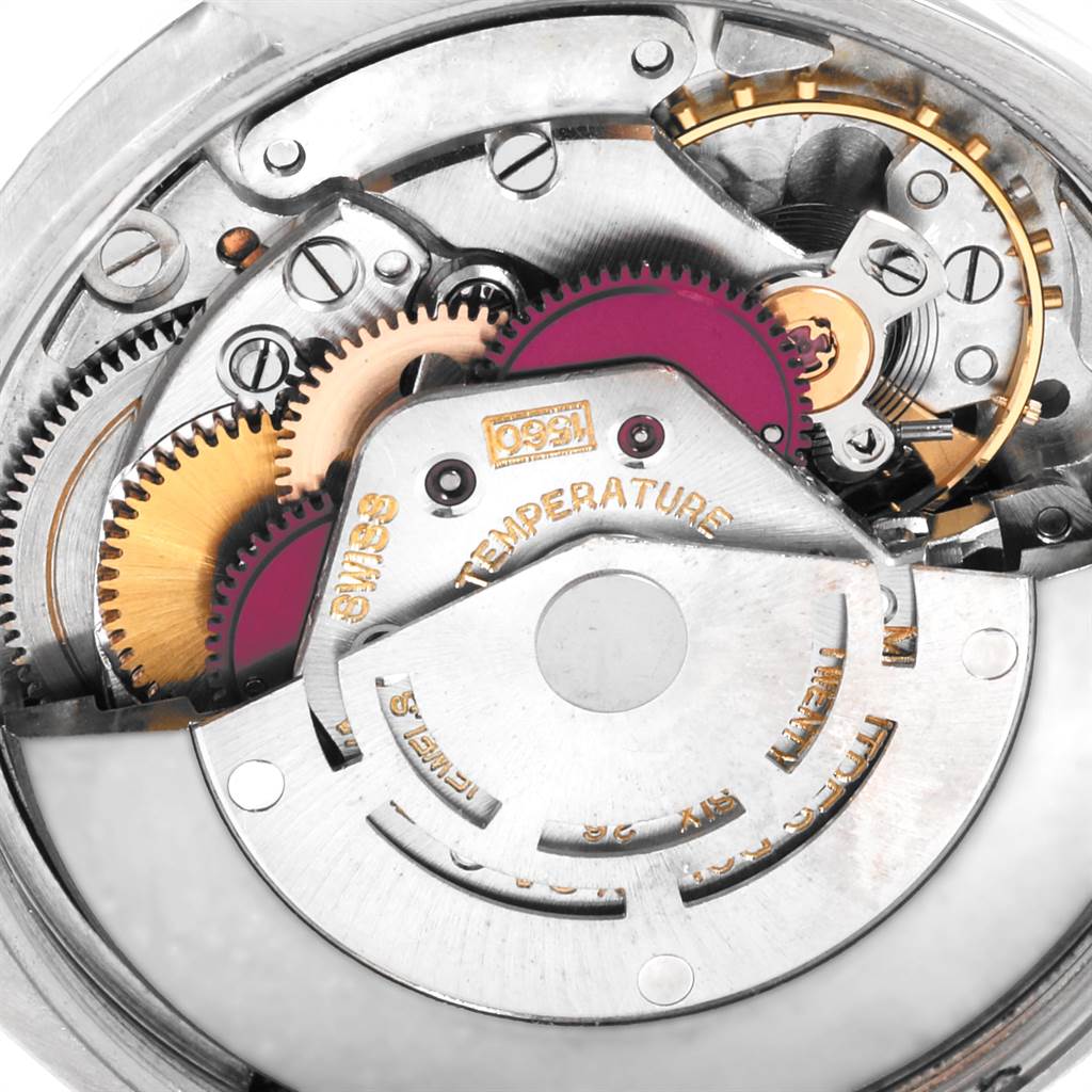 The image shows a close-up view of the inner mechanical movement of the Vintage Collection model by Rolex.