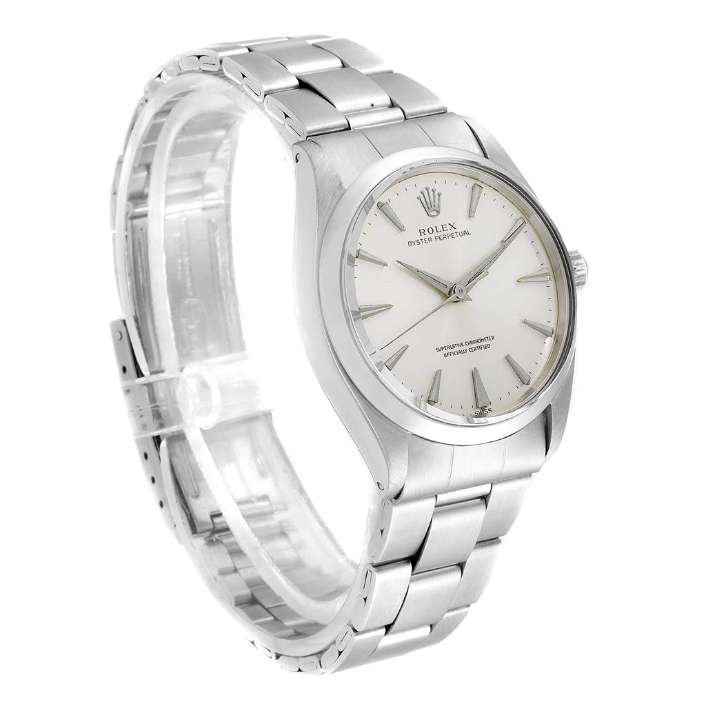 The image shows a front and angled view of the Vintage Collection Rolex watch, highlighting its dial and bracelet.
