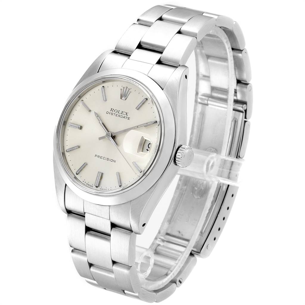 The Vintage Collection Rolex watch is shown at a slight angle, displaying the face, crown, bracelet, and clasp.