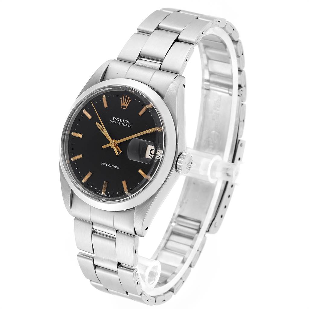 This image shows a side-angle view of the Vintage Collection Rolex Oysterdate, highlighting the face, bracelet, and crown.