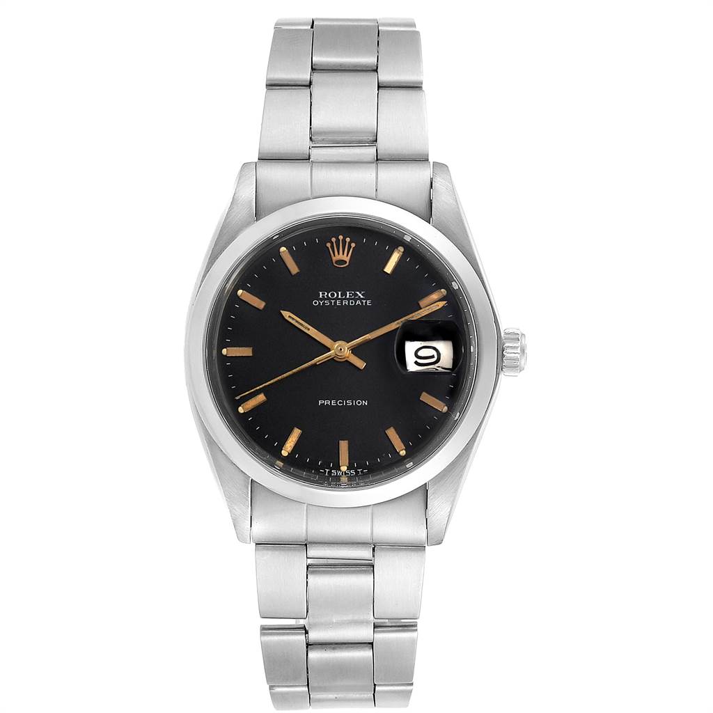 The image shows a front view of a Vintage Collection Rolex Oysterdate watch with a metal bracelet and a black dial featuring a date window.