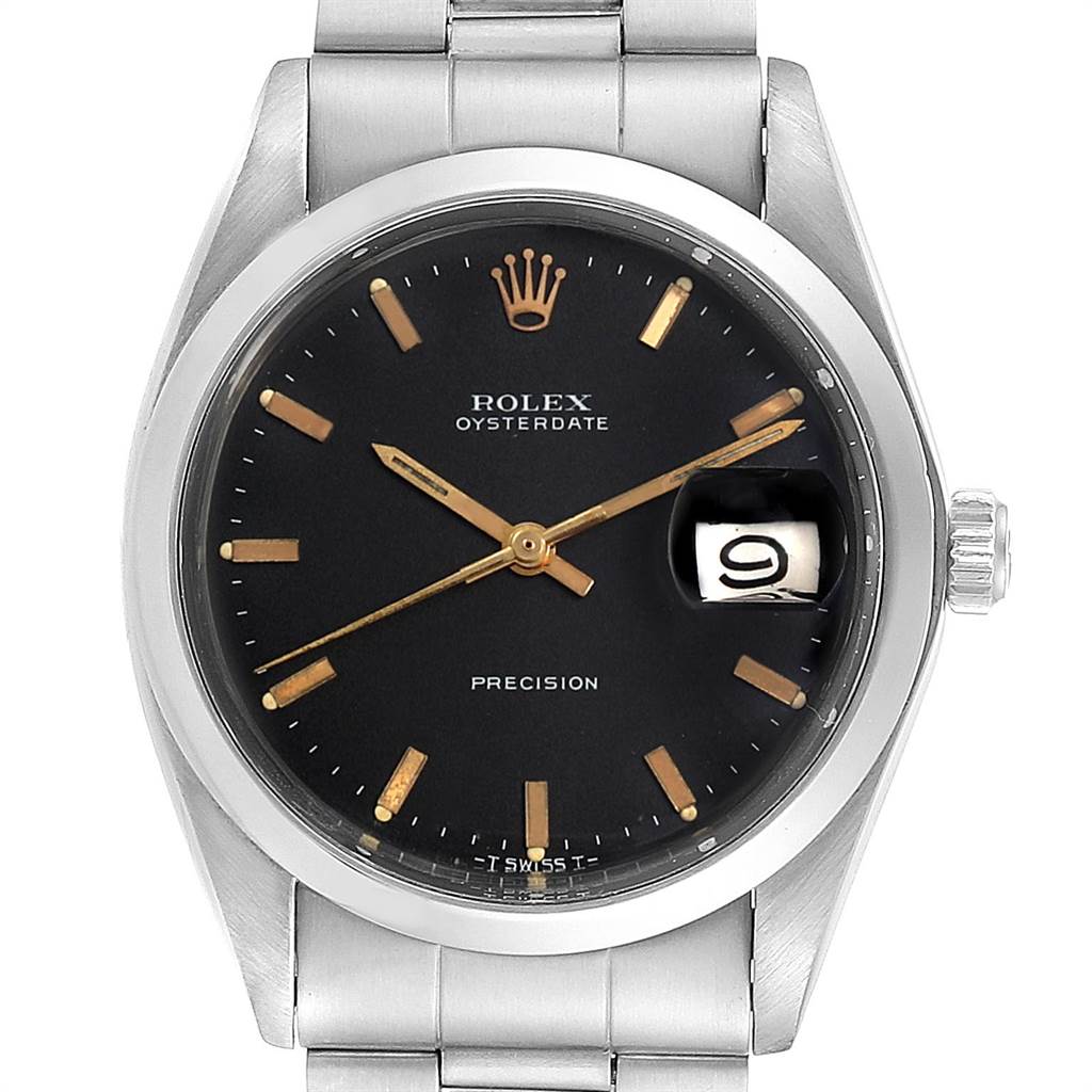 The image shows a front view of a Rolex Vintage Collection 6694 Men's Stainless Steel Black Dial 6694 Men's Stainless Steel Black Dial model watch displaying the dial, hands, crown, and part of its bracelet.