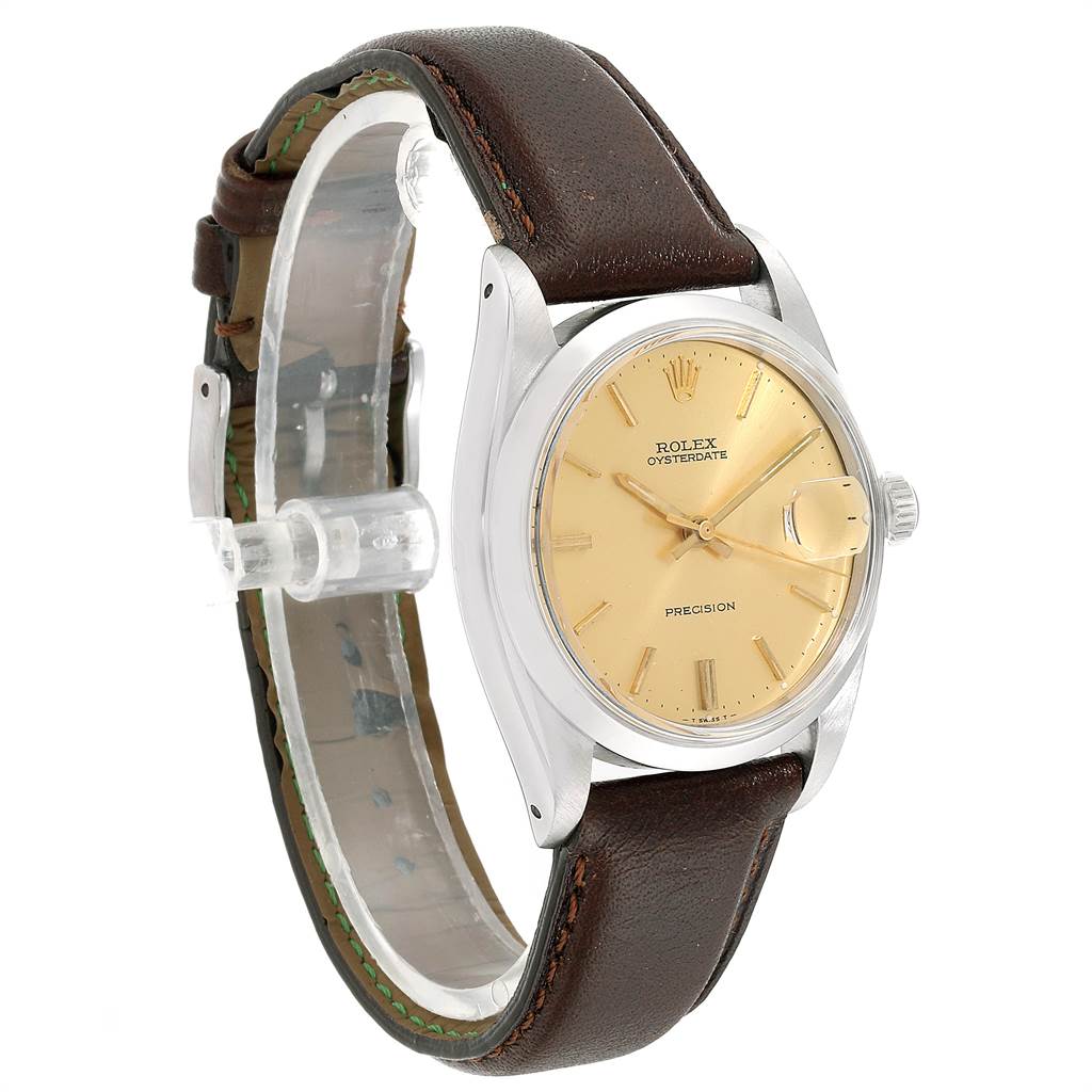 The image shows a Rolex Vintage Collection 6694 Men's Stainless Steel Champagne Dial 6694 Men's Stainless Steel Champagne Dial watch at a slight angle, highlighting its beige dial, brown leather strap, and silver case.