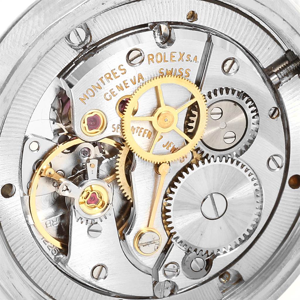 Close-up of the internal mechanical movement of a Rolex Vintage Collection 6694 Men's Stainless Steel Champagne Dial 6694 Men's Stainless Steel Champagne Dial watch, showing gears and components.