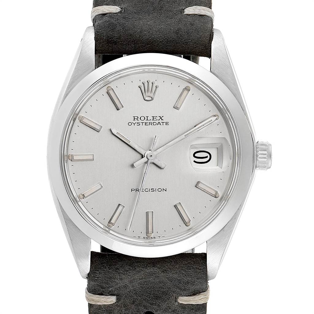 This image shows a Rolex Vintage Collection 6694 Men's Stainless Steel Silver Dial 6694 Men's Stainless Steel Silver Dial Oysterdate model watch at a straight-on angle, highlighting its dial, case, and leather strap.