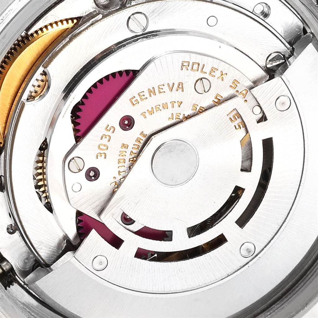 This image shows the intricate movement and mechanism of a Rolex Vintage Collection 16013 Men's Stainless Steel Champagne Dial 16013 Men's Stainless Steel Champagne Dial model watch from a close-up angle.