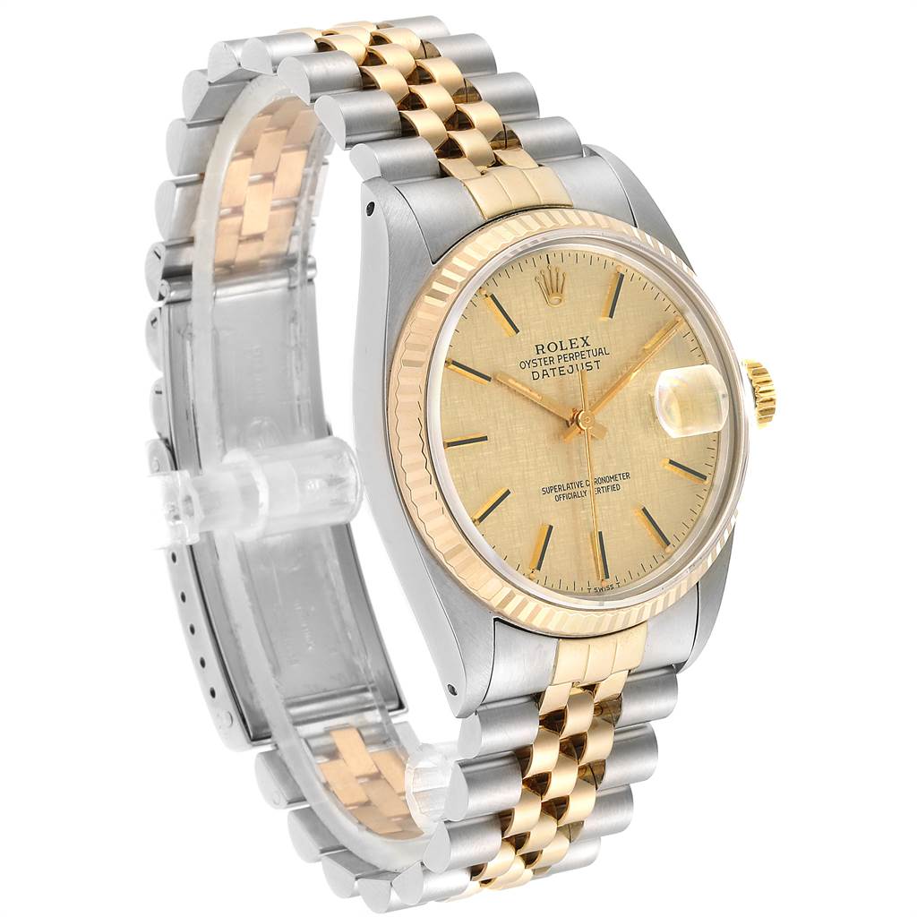 This image shows a side angle of the Rolex Vintage Collection 16013 Men's Stainless Steel Champagne Dial 16013 Men's Stainless Steel Champagne Dial Oyster Perpetual Datejust watch, highlighting its face and band.