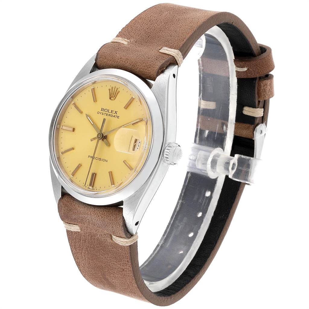 The image shows a Rolex Vintage Collection 6694 Men's Stainless Steel Champagne Dial 6694 Men's Stainless Steel Champagne Dial watch at a 3/4 angle, displaying the face, crown, and brown leather strap.