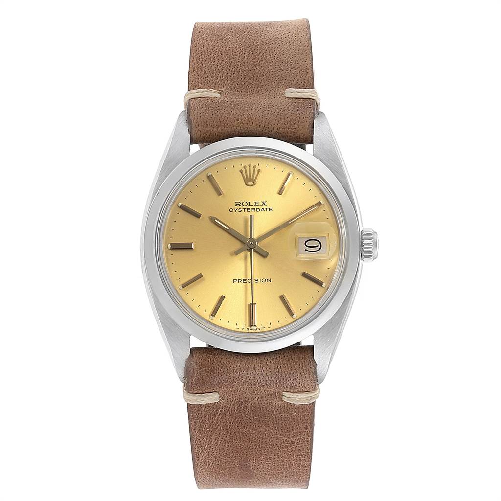 The Vintage Collection Rolex watch is shown from a top-down angle, displaying its face, bezel, crown, and brown leather strap.