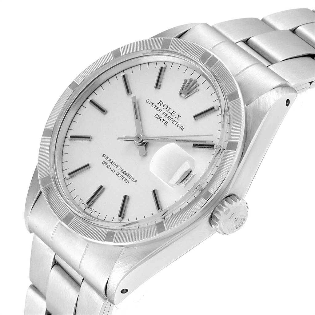 The image shows a Vintage Collection Rolex Oyster Perpetual Date watch from a slight side angle, highlighting the dial, bezel, crown, and bracelet.