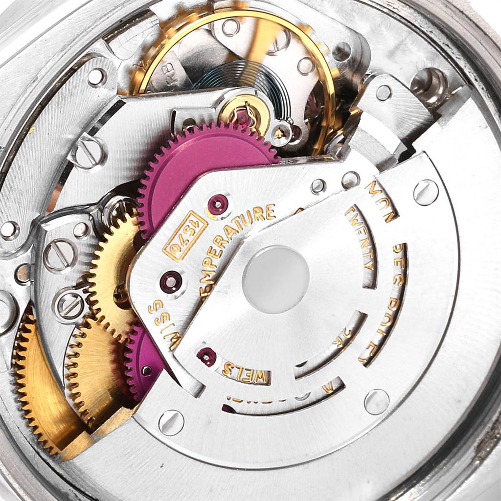 The image shows a close-up of the movement mechanism of a Rolex Vintage Collection 1501 Men's Stainless Steel Silver Dial 1501 Men's Stainless Steel Silver Dial watch.