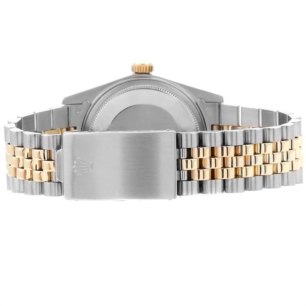 The image shows the back view of a Rolex Vintage Collection 16013 Men's Stainless Steel Blue Dial 16013 Men's Stainless Steel Blue Dial watch, highlighting the clasp, bracelet, and case back.