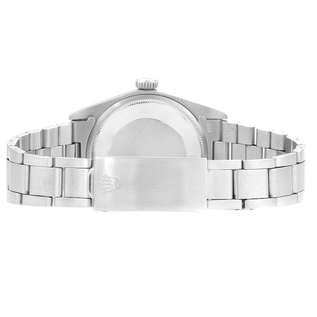 The image shows the back view of the case and clasp of a Rolex Vintage Collection 1500 Men's Stainless Steel Silver Dial 1500 Men's Stainless Steel Silver Dial model watch.