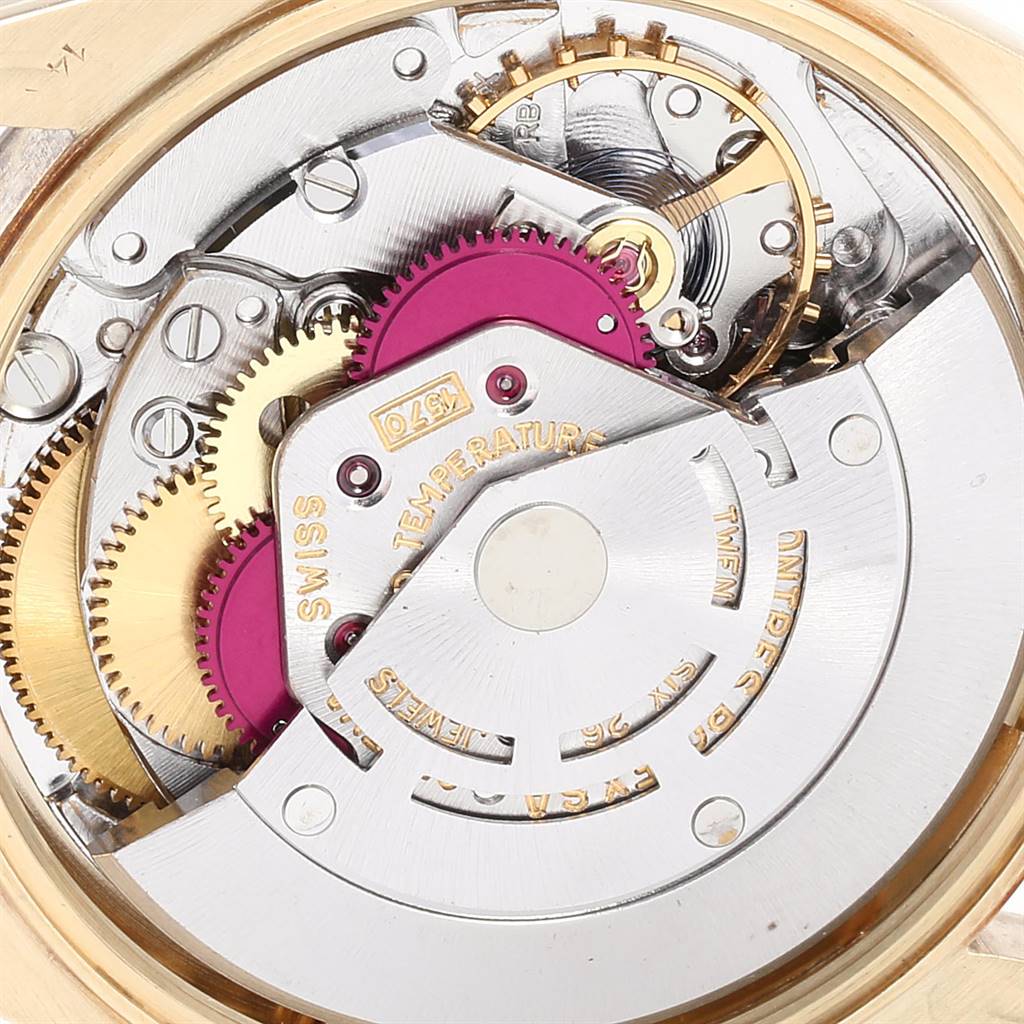 The image shows the intricate inner mechanical parts of a Rolex Vintage Collection 1503 Men
s Yellow Gold Silver Dial 1503 Men
s Yellow Gold Silver Dial model watch from a close-up angle.