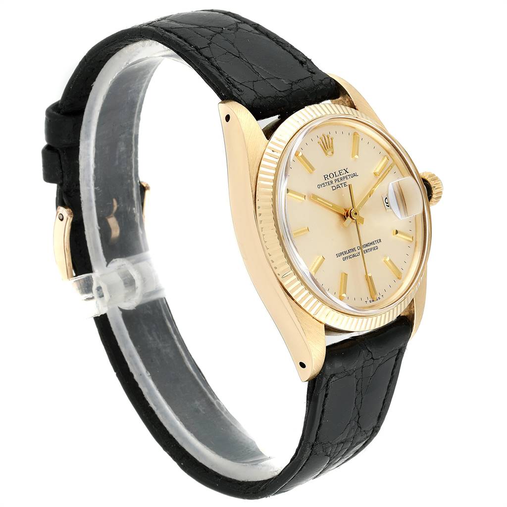 This image shows a side view of the Rolex Vintage Collection 1503 Men
s Yellow Gold Silver Dial 1503 Men
s Yellow Gold Silver Dial watch, highlighting its gold case, crown, dial, and black leather strap.