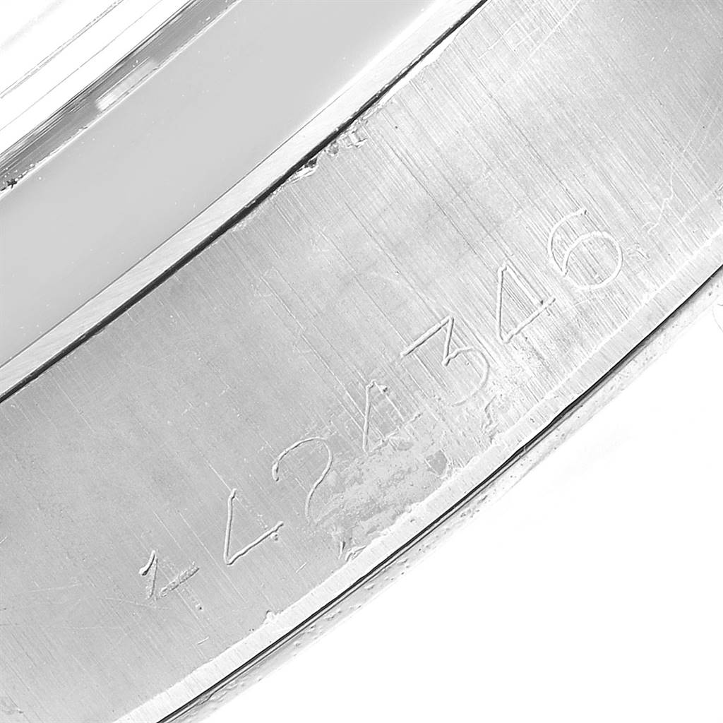 This image shows a close-up of the case back with serial number engraving on a Rolex Vintage Collection 6694 Men's Stainless Steel Black Dial 6694 Men's Stainless Steel Black Dial model.