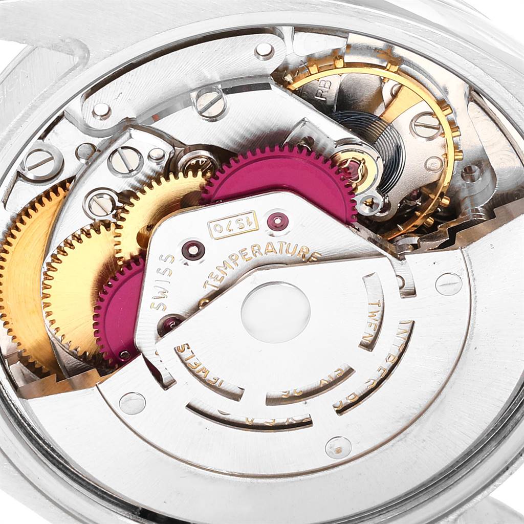 This image shows a close-up of the movement and internal gears of the Vintage Collection model by Rolex.