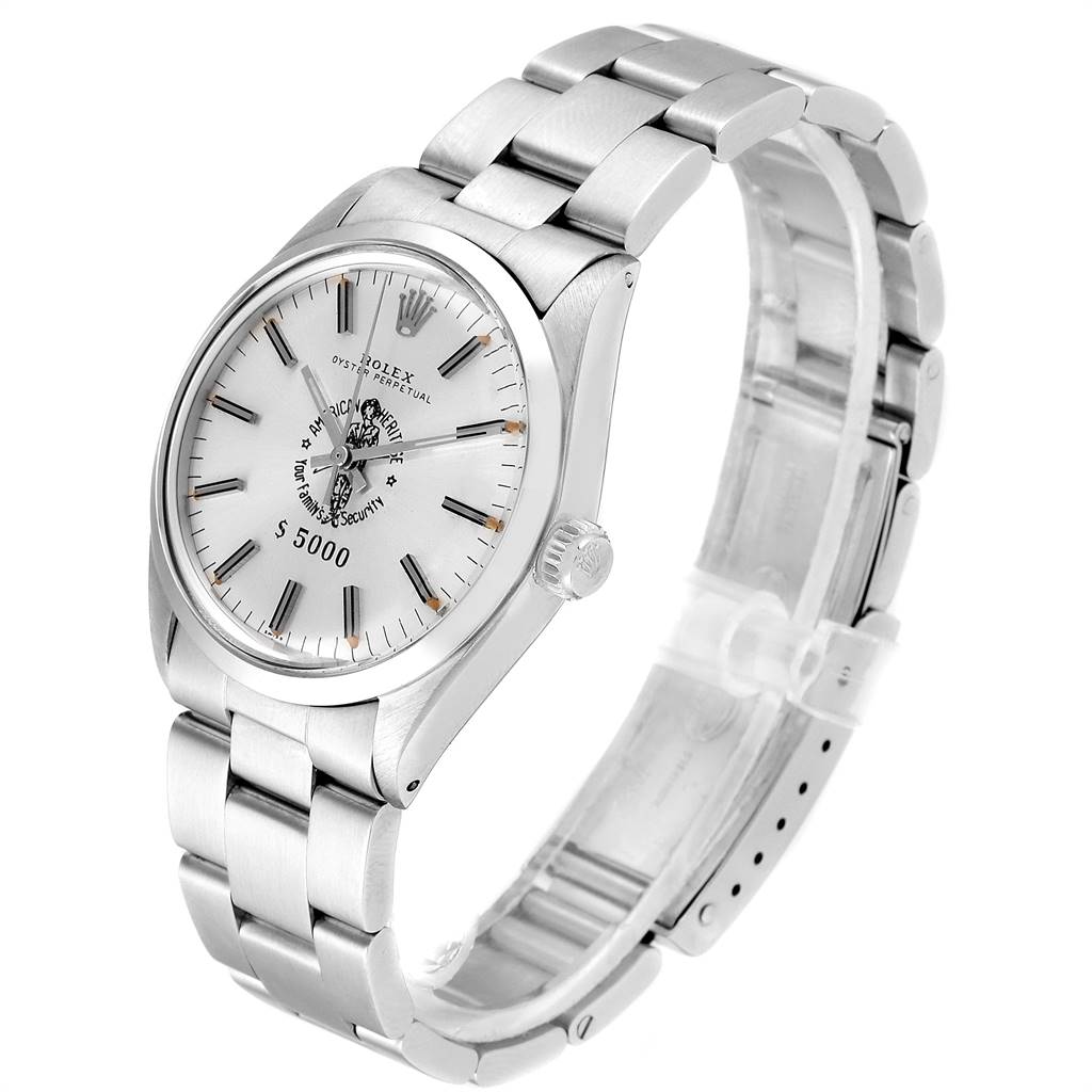 The Vintage Collection Rolex watch is shown at a three-quarter angle, displaying its dial, bezel, case, and metal bracelet.